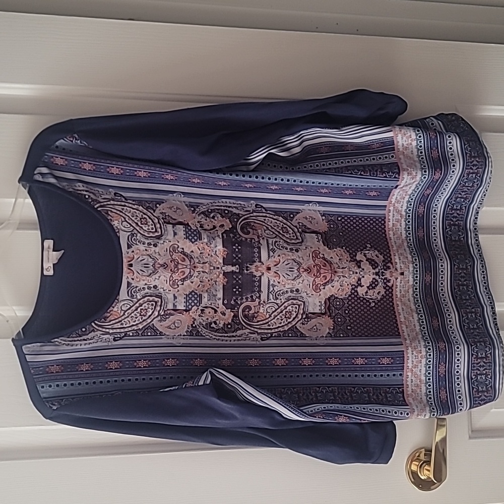 Knit and woven top.